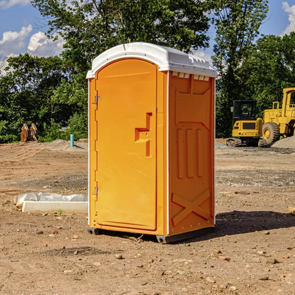 what is the cost difference between standard and deluxe portable restroom rentals in Vaughnsville OH